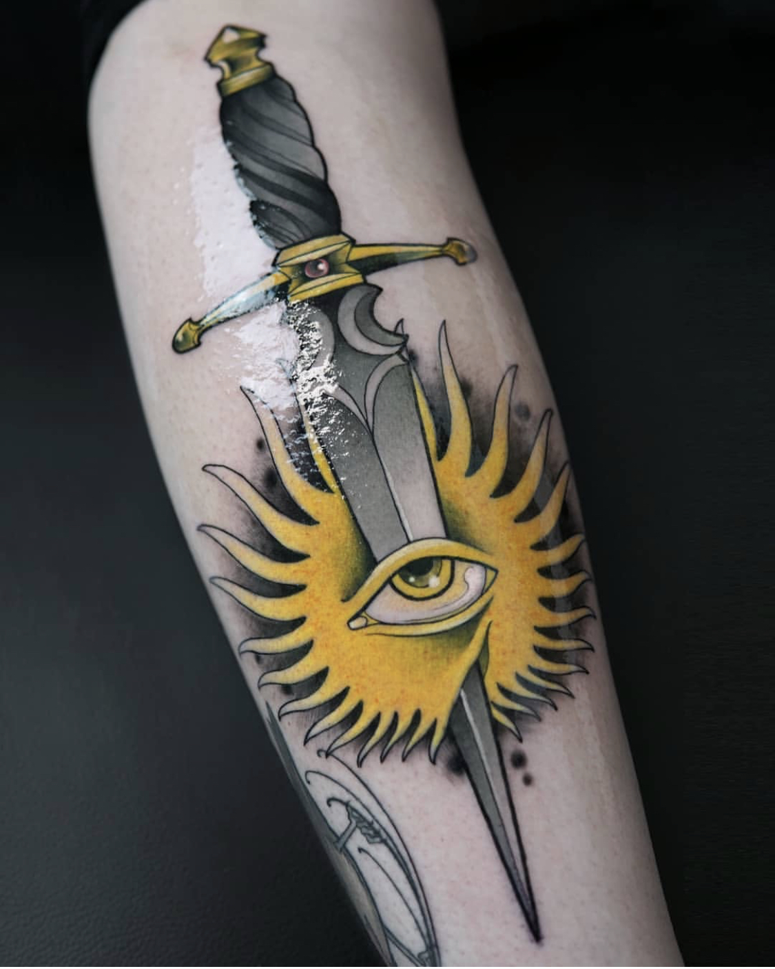 panther head dagger tattoo